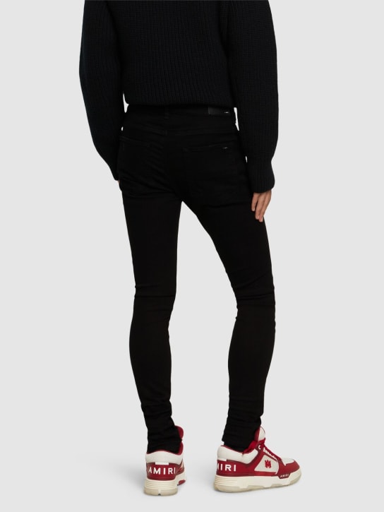 Amiri: 15cm Stack cotton denim jeans - Black - men_2 | Luisa Via Roma