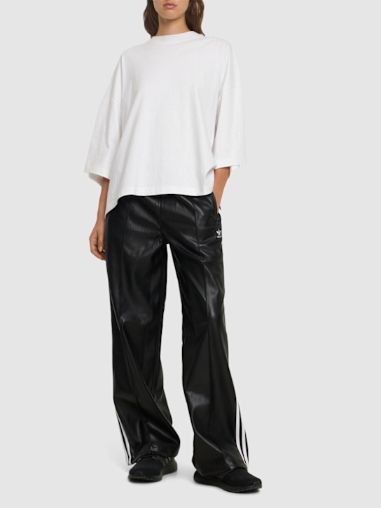 adidas Originals: Firebird faux leather pants - Black/White - women_1 | Luisa Via Roma