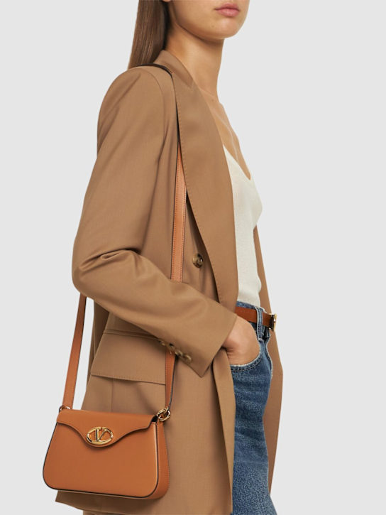 Valentino Garavani: Mini Vlogo Bold leather shoulder bag - women_1 | Luisa Via Roma