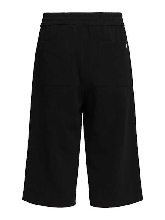 AMI Paris: Oversized cotton Bermuda shorts - Black - men_3 | Luisa Via Roma