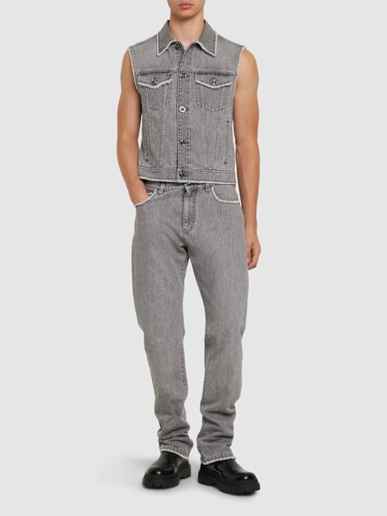 Versace: Stonewashed cotton denim straight jeans - men_1 | Luisa Via Roma