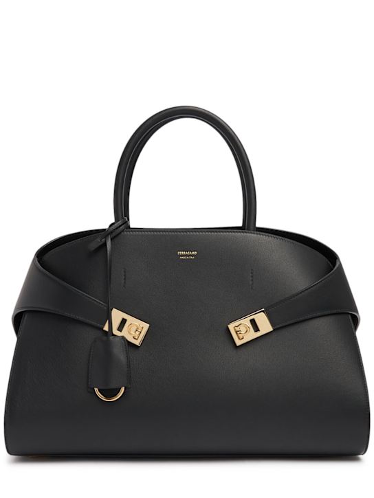 Ferragamo: Medium Hug leather tote bag - Black - women_0 | Luisa Via Roma