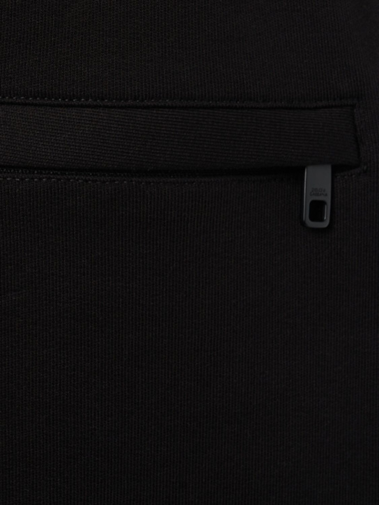 Dolce&Gabbana: Logo embossed jersey jogging pants - Black - men_2 | Luisa Via Roma