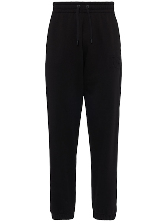 Dolce&Gabbana: Logo embossed jersey jogging pants - Black - men_0 | Luisa Via Roma