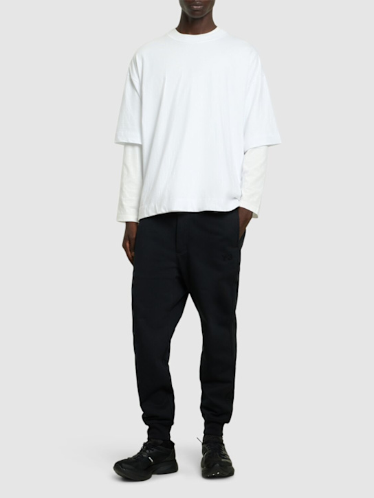 Y-3: Cotton blend sweatpants - men_1 | Luisa Via Roma
