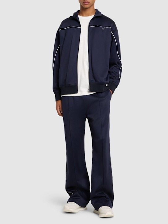 Valentino: Double cotton blend jersey track pants - men_1 | Luisa Via Roma