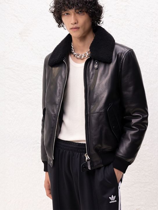 adidas Originals: Baggy track pants - men_1 | Luisa Via Roma