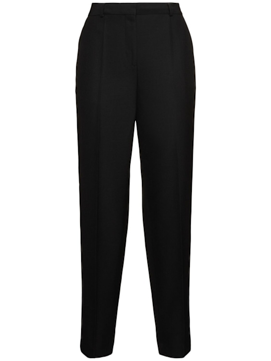 Toteme: Low-waist tailored wool blend pants - women_0 | Luisa Via Roma