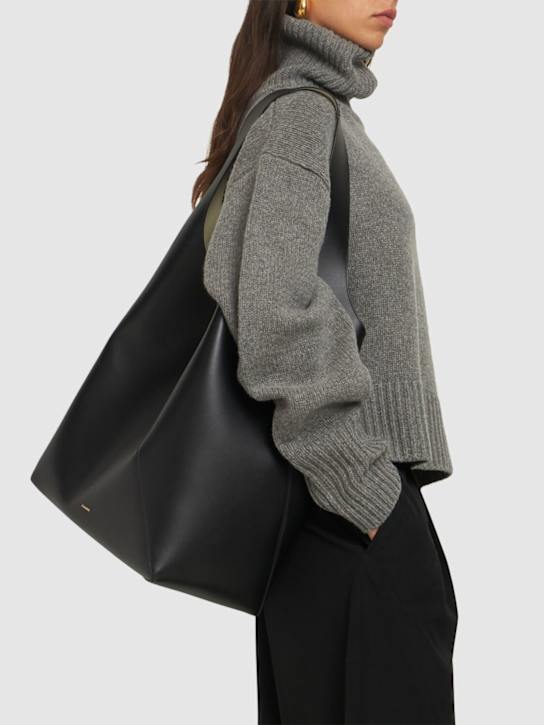 Jil Sander: Large Vertigo smooth leather hobo bag - women_1 | Luisa Via Roma