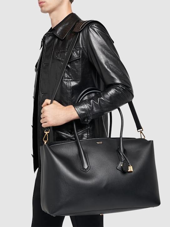 Tom Ford: Logo smooth leather duffle bag - Black - men_1 | Luisa Via Roma