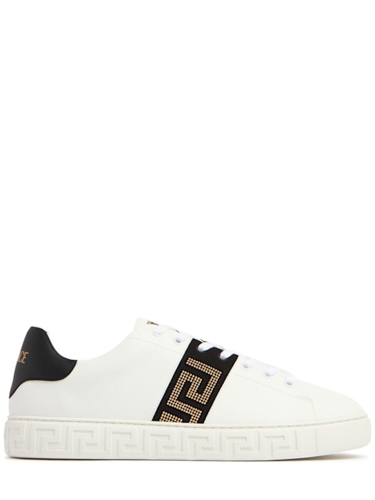 Versace: Studded low top sneakers - men_0 | Luisa Via Roma