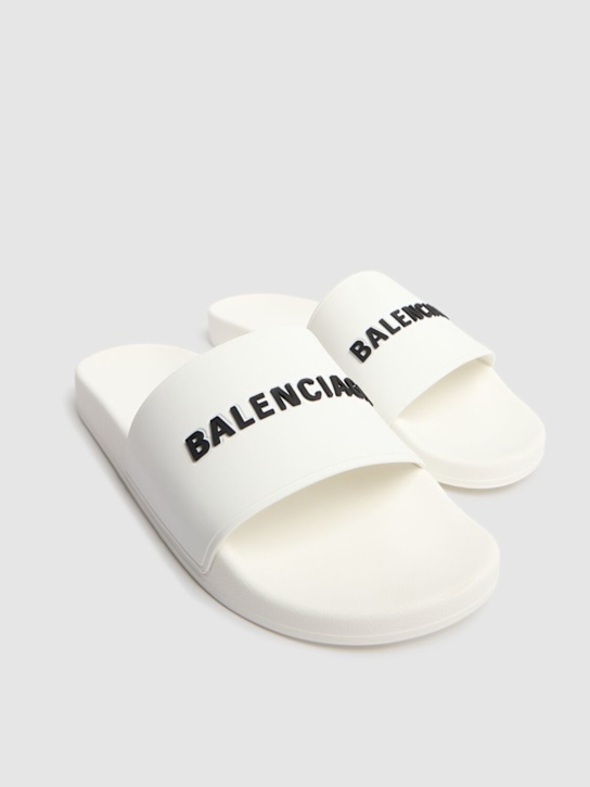 Balenciaga: Logo rubber pool slide sandals - White/Black - men_2 | Luisa Via Roma
