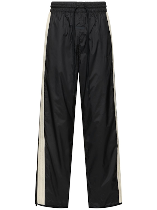 adidas Originals: Fear Of God woven relaxed track pants - men_0 | Luisa Via Roma