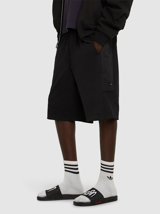 adidas Originals: Korn Adilette slides - men_1 | Luisa Via Roma