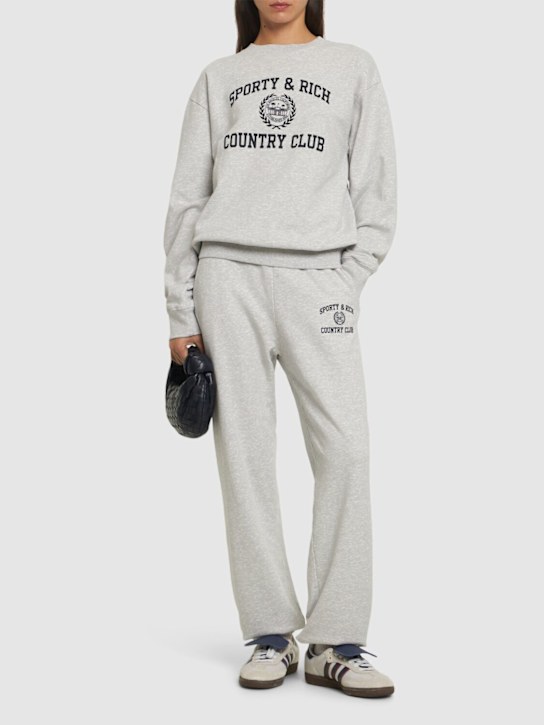 Sporty & Rich: Varsity Crest sweatpants - women_1 | Luisa Via Roma