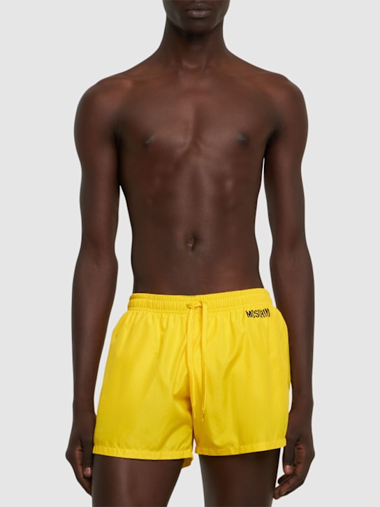 Moschino: Iconic Archive swim shorts - Yellow - men_1 | Luisa Via Roma