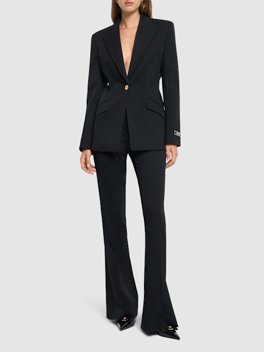 Versace: Stretch virgin wool mid rise flare pants - women_1 | Luisa Via Roma