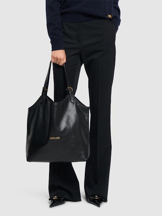 Versace: Versace Tag leather tote bag - women_1 | Luisa Via Roma