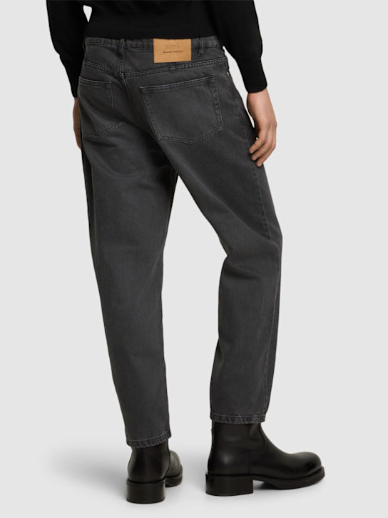 AMI Paris: Tapered cotton denim jeans - men_2 | Luisa Via Roma