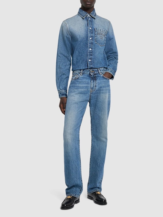 Versace: Stonewashed denim jeans - men_1 | Luisa Via Roma