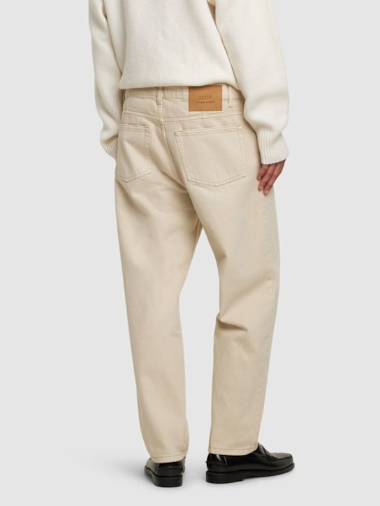 AMI Paris: Tapered cotton denim jeans - men_2 | Luisa Via Roma