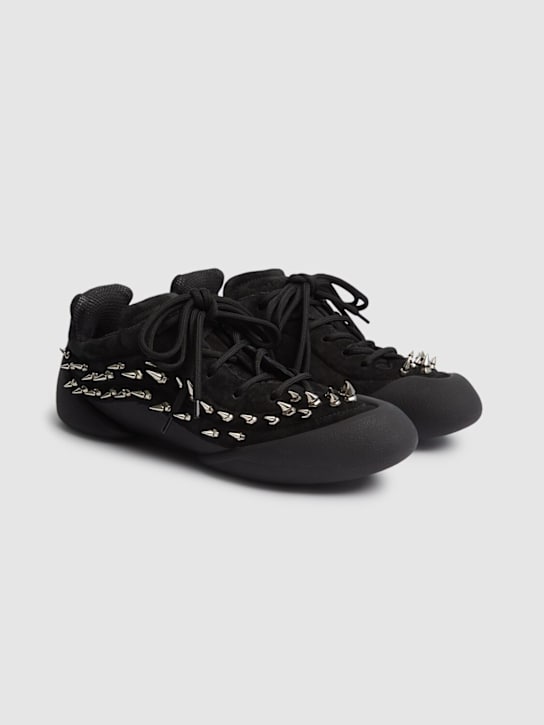 McQueen: Flexion studded leather sneakers - Black - men_2 | Luisa Via Roma
