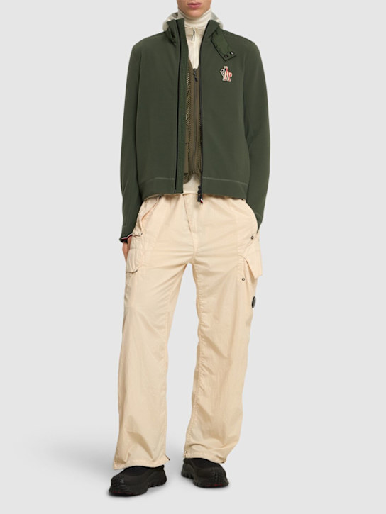 Moncler Grenoble: Logo stretch tech zip-up cardigan - men_1 | Luisa Via Roma