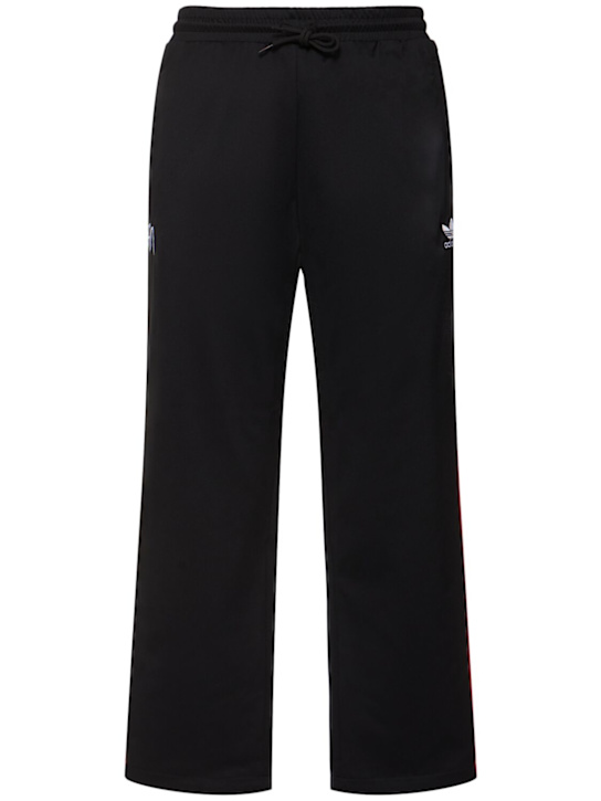 adidas Originals: Korn track pants - men_0 | Luisa Via Roma