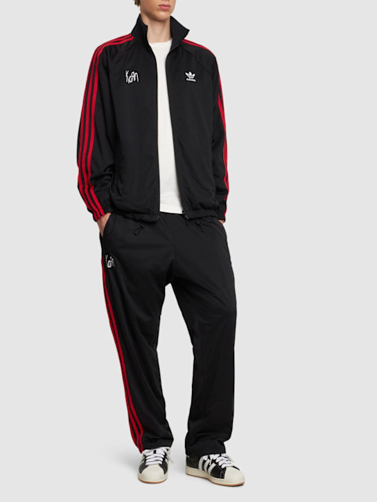 adidas Originals: Korn track pants - men_1 | Luisa Via Roma