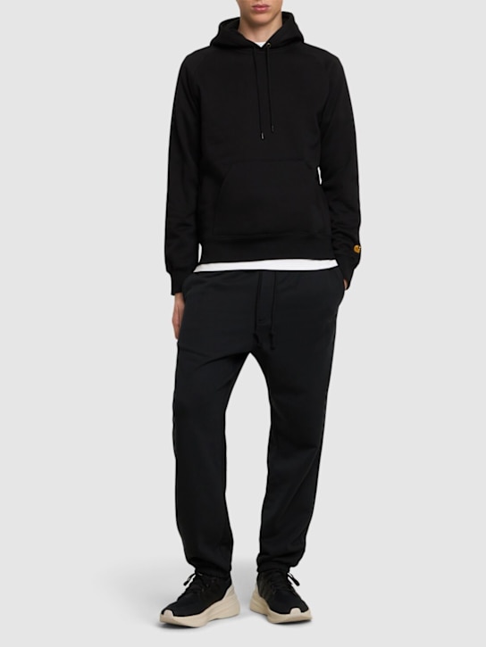 Y-3: Cotton blend track pants - men_1 | Luisa Via Roma