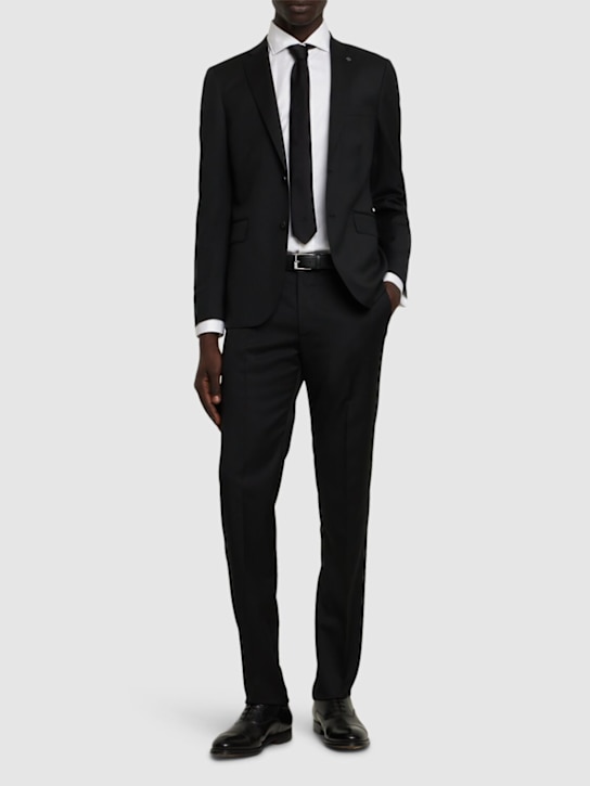 Tagliatore: Super 110's virgin wool suit - Black - men_1 | Luisa Via Roma