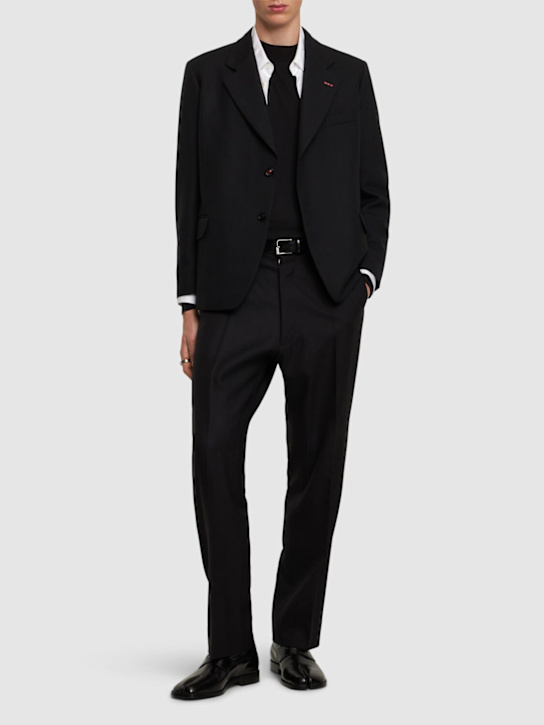 Maison Margiela: Wool herringbone pants - men_1 | Luisa Via Roma