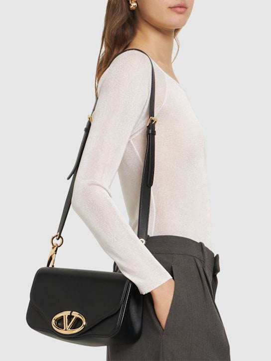 Valentino Garavani: Small Logo leather shoulder bag - women_1 | Luisa Via Roma
