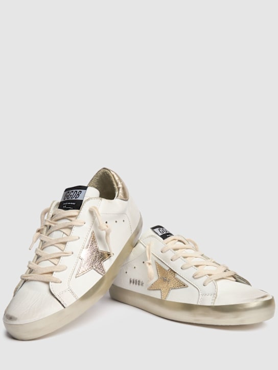 Golden Goose: 20毫米Super-Star皮革运动鞋 - 白色/金色 - women_3 | Luisa Via Roma