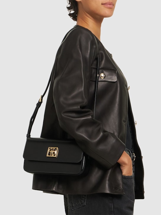 ANINE BING: Elly high-shine leather crossbody bag - women_1 | Luisa Via Roma