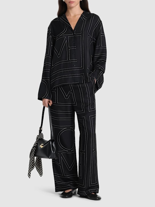 Toteme: Monogram embroidered silk pants - Black - women_1 | Luisa Via Roma