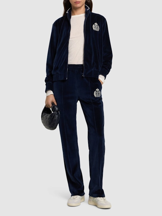 Sporty & Rich: NY Crest velour track pants - women_1 | Luisa Via Roma