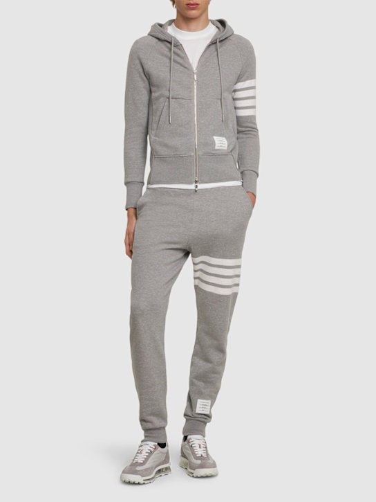 Thom Browne: Intarsia stripes cotton sweatpants - men_1 | Luisa Via Roma