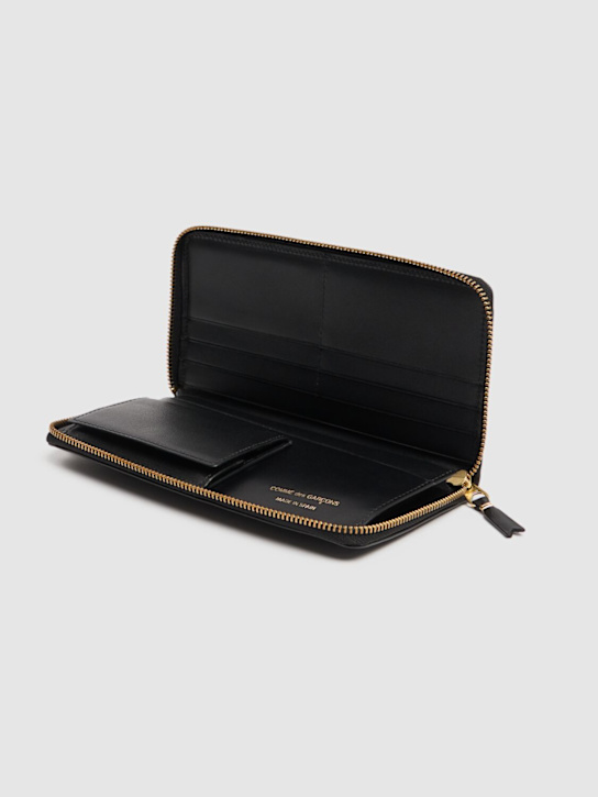 Comme des Garçons Wallet: Classic leather zip-around wallet - men_1 | Luisa Via Roma