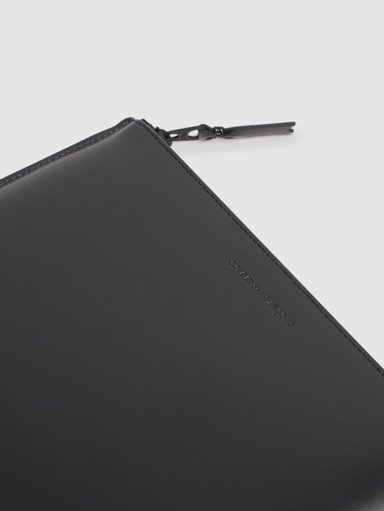 Comme des Garçons Wallet: Very black leather pouch - men_1 | Luisa Via Roma
