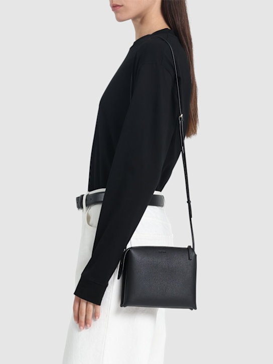 The Row: Nu mini Twist grain leather shoulder bag - Black - women_1 | Luisa Via Roma