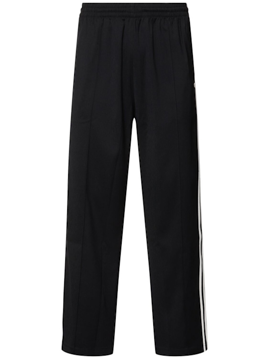 adidas Originals: Pantalones deportivos baggy - Negro - men_0 | Luisa Via Roma