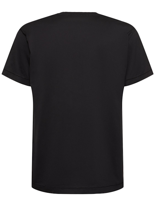 Logo cotton t-shirt - Stone Island - Men  | Luisaviaroma