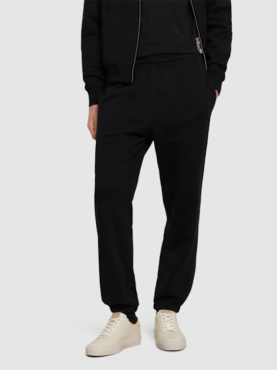 Burberry: Jogginghose mit Burberry Check-Label - Schwarz - men_2 | Luisa Via Roma