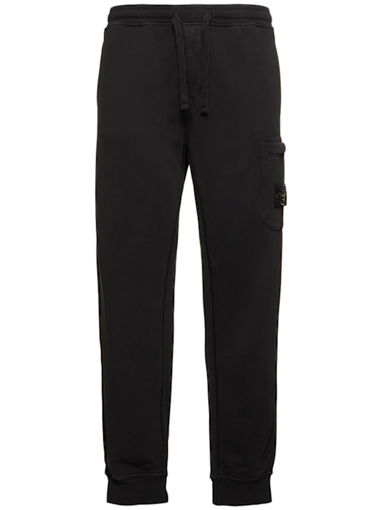 Stone Island: Cotton logo patch sweatpants - men_0 | Luisa Via Roma
