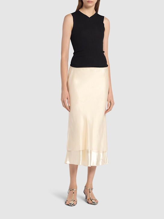 Khaite: Monina shiny viscose midi skirt - women_1 | Luisa Via Roma