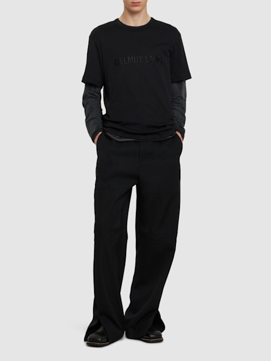 Helmut Lang: T-shirt in cotone con logo - men_1 | Luisa Via Roma