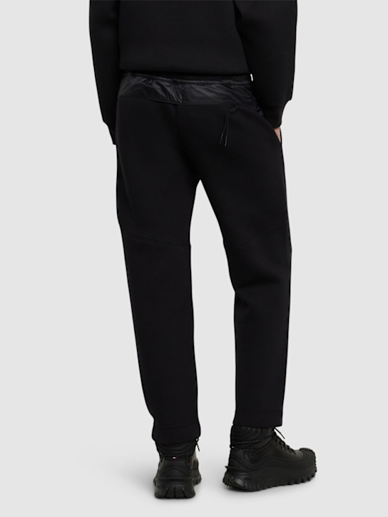 Moncler: CNY cotton blend sweatpants - Black - men_2 | Luisa Via Roma