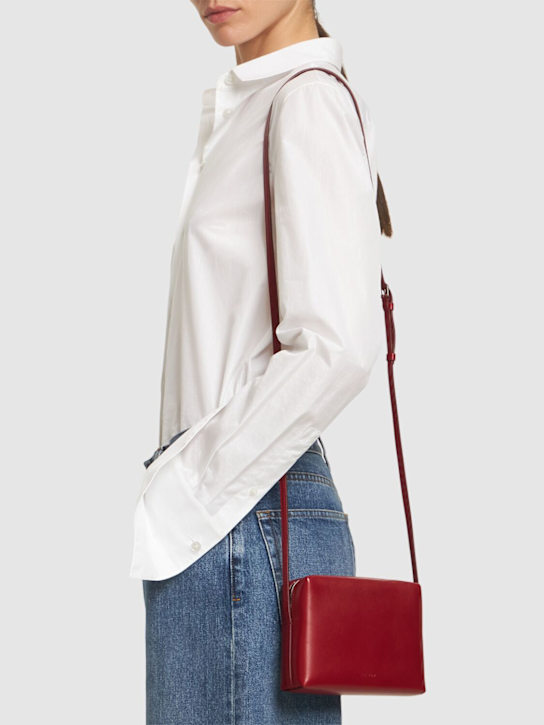 The Row: Regent nappa leather crossbody bag - Barn Red Ans - women_1 | Luisa Via Roma