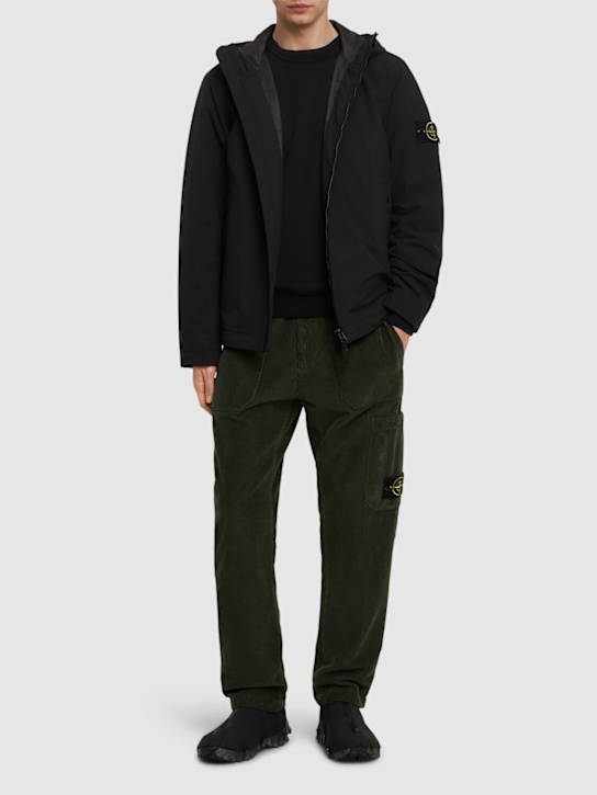 Stone Island: Short hooded parka - men_1 | Luisa Via Roma